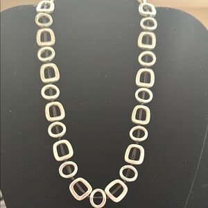 Mod look silver necklace on black cord